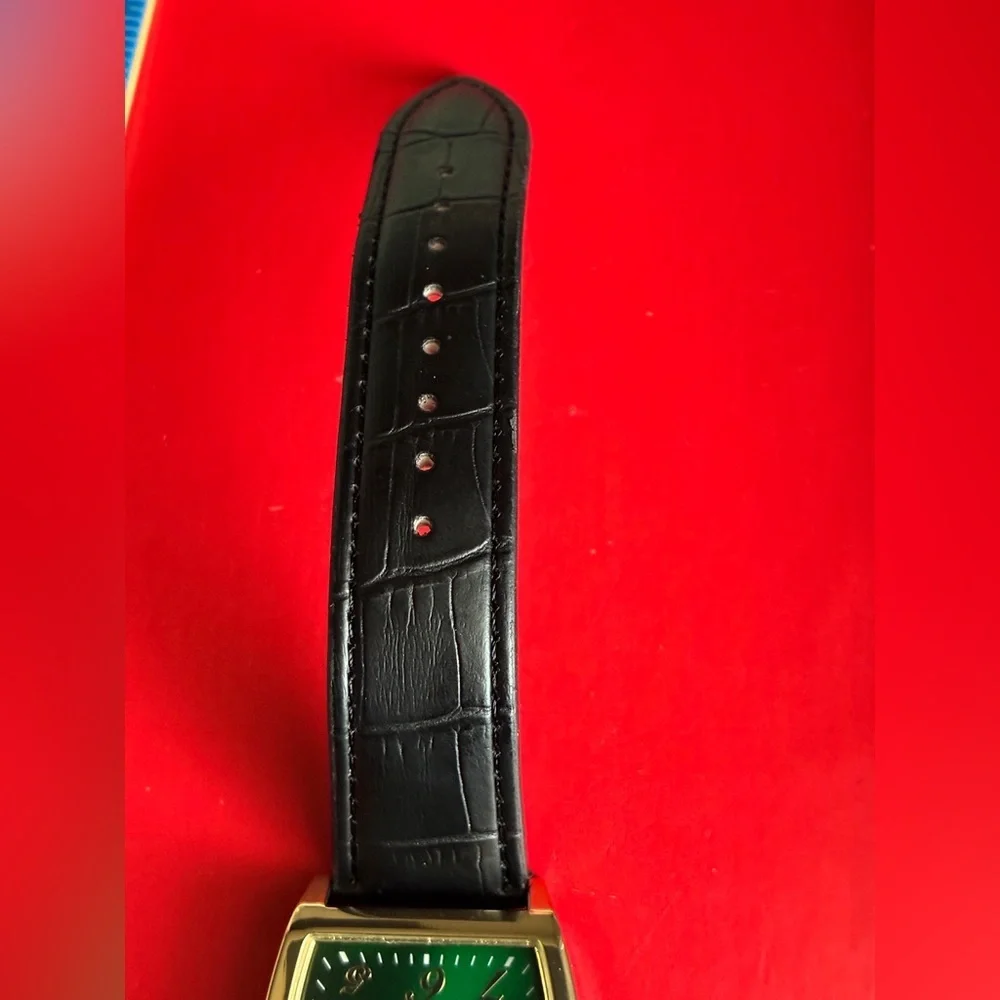 Tahari Gold and Black Men's Watch with Green Dial